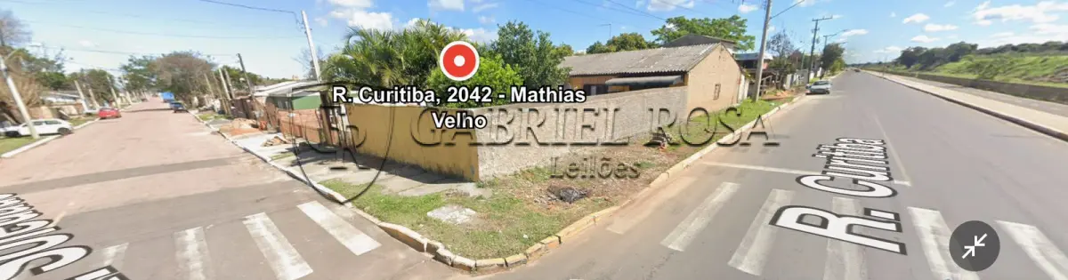 LOTE 003 - Casa com 02 domitórios, espaço de cozinha e sala integrados, 01 banheiro, 01 sala pequena, lavanderia e garagem coberta, e o respectivo terreno com área  superficial de 420 m², situada na Rua Curitiba, nº 2042, Bairro Mathias Velho, Canoas/RS. Registrado sob matrícula 41.867