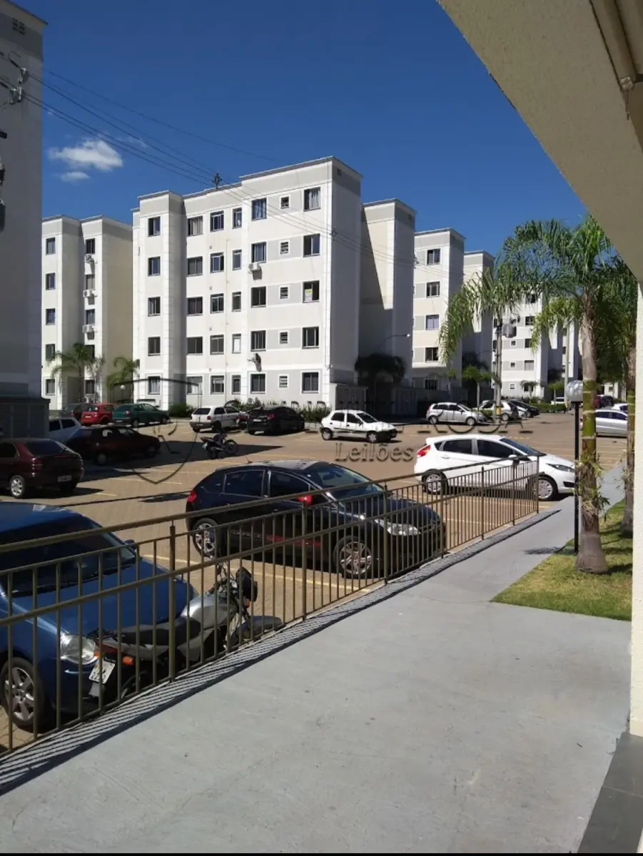 LOTE 003 - Apartamento nº 404, do Bloco 05, localizado no 4º pavimento com área real privativa de 43,3700 m², e o Box  nº 201, com área de 11,52 m² descoberto, do Condomínio Residencial Parque Porto Burnier, situado na Rua Getúlio Borges da Fonseca, nº 96, Bairro Operário - Novo Hamburgo/RS. Registrado sob matrícula 116.416