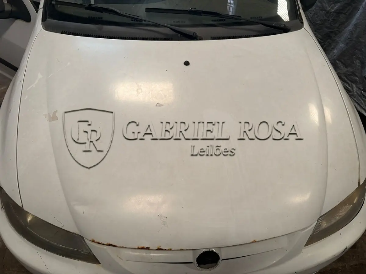 LOTE 002 - Chevrolet Celta 4P Spirit Flex, Ano/Modelo: 2005/2006, Cor: Branca, Placa: IMV4697