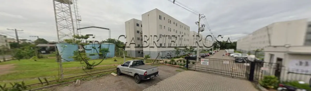 LOTE 001 - DIREITOS E AÇÕES do Apartamento nº 14, Bloco G, do Residencial Salgado Filho, localizado no andar térreo ou primeiro pavimento, com área real total de 56,702233 m², sendo 45,64 m² de área real privativa e 11,062233 m² de área real de uso comum, sendo 5,0985 m² de área coberta e 5,963733 m² de área descoberta. Constituído de sala de estar, cozinha/área de serviço, banheiro e 02 dormitórios. Situado na Rua Evaldo Luiz de Souza, nº 10, Bairro Canudos, Novo Hamburgo/RS. Registrado sob matrícula nº 128.678