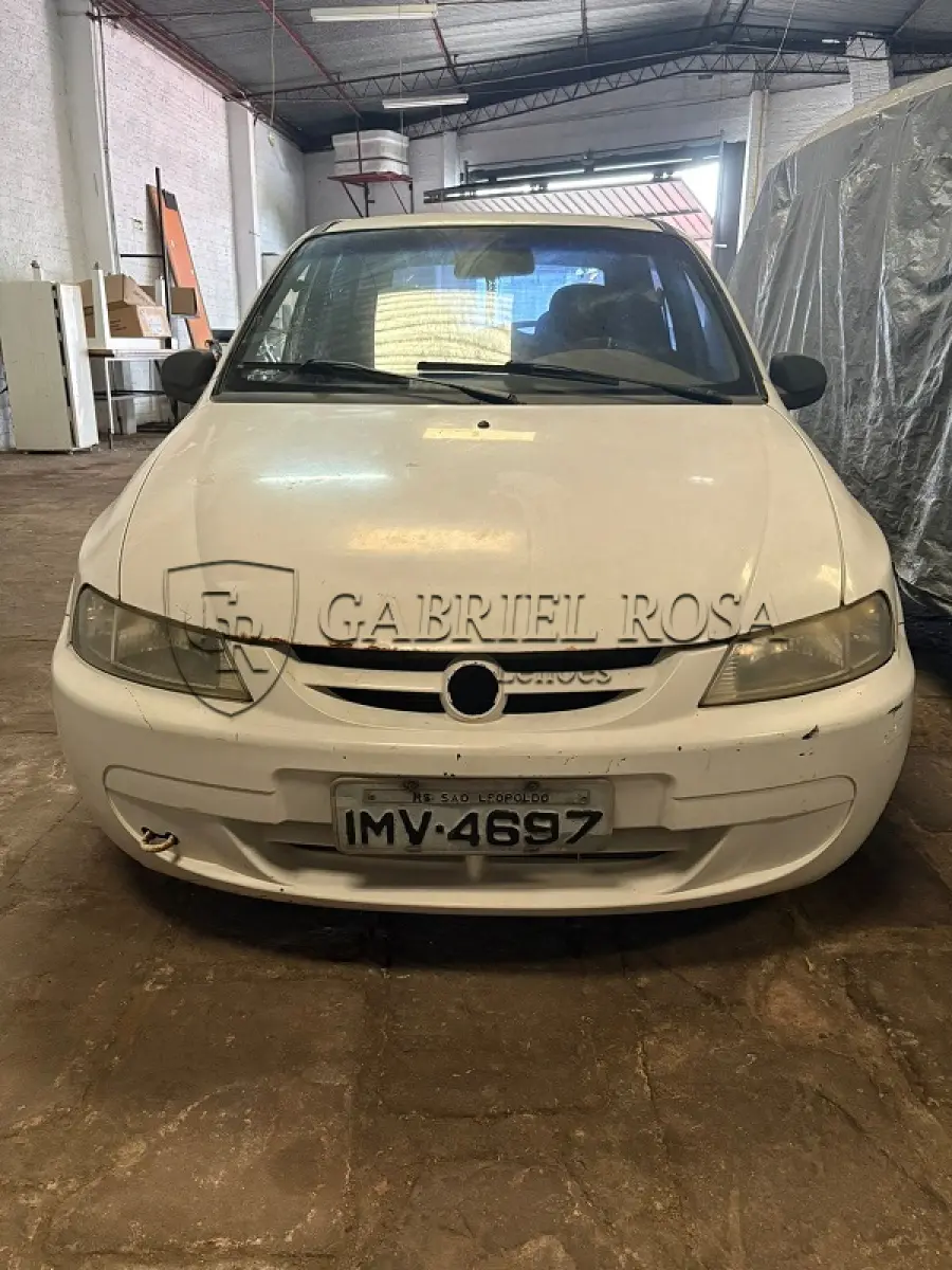 LOTE 002 - Chevrolet Celta 4P Spirit Flex, Ano/Modelo: 2005/2006, Cor: Branca, Placa: IMV4697