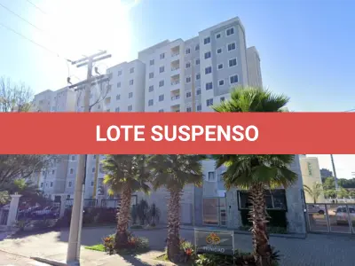 LOTE 002 - Apartamento nº 405, da Torre 01, do Condomínio Porto Trinidad, com área real privativa de  46,91 m², e o Box nº 189, com área de 11,52 m², descoberta livre. Situado na Rua Avaí, nº 119, Bairro Vila Rosa, Novo Hamburgo/RS. Registrado sob matrícula nº 121.760