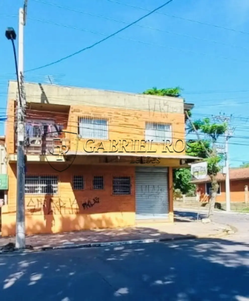 LOTE 007 - UM PRÉDIO DE ALVENARIA COM DOIS PISOS COM ÁREA TOTAL DE 314,00M2, LOCALIZADO NA RUA PORTÃO Nº 2676, BAIRRO BELA VISTA EM ESTÂNCIA VELHA/RS