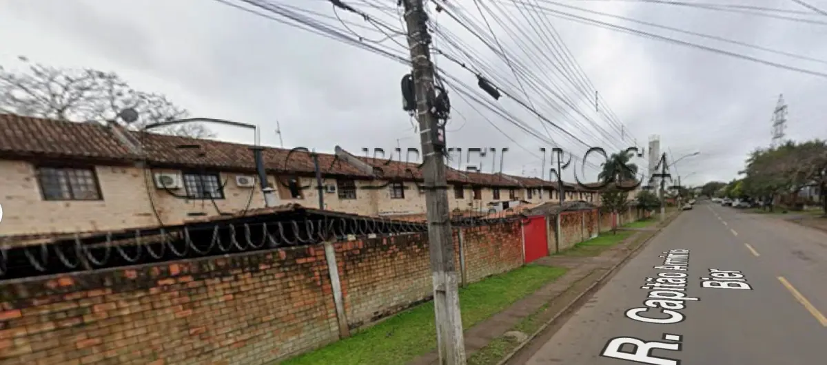 LOTE 002 - Sobrado Residencial nº 111 do Residencial Cidade Jardim, com área real privativa de 43,4710m², constituído de sala de estar, cozinha e banho no pavimento inferior, e circulação e 02(dois) dormitórios no pavimento superior, com uma área de terreno de 5,95m² de utilização exclusiva, situado na Rua Capitão Armínio Bier, nº 475, esquina com a Avenida Tomaz Edison, Bairro Vicentina, São Leopoldo/RS. Registrado sob matrícula 66.357