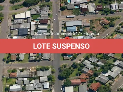LOTE 004 - Terreno com aproximadamente 360m², com 02 construções não averbadas, situado na Rua Zeno Schmiedel, nº 547, Bairro Floresta, Estância Velha. Registrado sob matrícula 2299