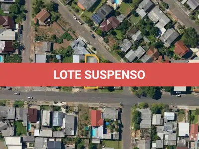 LOTE 004 - Terreno com aproximadamente 360m², com 02 construções não averbadas, situado na Rua Zeno Schmiedel, nº 547, Bairro Floresta, Estância Velha. Registrado sob matrícula 2299