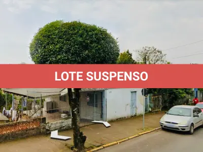 LOTE 001 - Uma casa mista de aproximadamente 48m², com padrão simples de construção e área coberta de 20m², e o respectivo terreno com 314,82 m², situada na Rua João Wendelino Hennemann, nº 579 - Bairro Rondônia - Novo Hamburgo/RS. Registrada sob matrícula nº 56.162