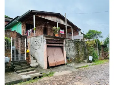 LOTE 009 - UM TERRENO, SITUADO NA ZONA ESPECIAL DE INTERESSE SOCIAL 2 (ZEIS 2), BAIRRO RINCÃO DOS ILHÉUS EM ESTÂNCIA VELHA - RS, COMPOSTO DO LOTE 05 DA QUADRA N DO LOTEAMENTO ALTO DA COLINA,  COM UMA RESIDENCIA DE ALVENARIA COM A ÁREA DE 24,30M2, NA RUA MARIA JULIA TREIN Nº 15.