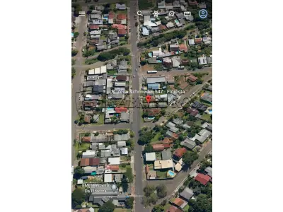 LOTE 003 - Terreno com aproximadamente 360m², com 02 construções não averbadas, situado na Rua Zeno Schmiedel, nº 547, Bairro Floresta, Estância Velha. Registrado sob matrícula 2299