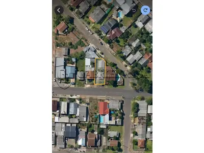 LOTE 003 - Terreno com aproximadamente 360m², com 02 construções não averbadas, situado na Rua Zeno Schmiedel, nº 547, Bairro Floresta, Estância Velha. Registrado sob matrícula 2299