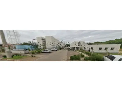 LOTE 001 - DIREITOS E AÇÕES do Apartamento nº 14, Bloco G, do Residencial Salgado Filho, localizado no andar térreo ou primeiro pavimento, com área real total de 56,702233 m², sendo 45,64 m² de área real privativa e 11,062233 m² de área real de uso comum, sendo 5,0985 m² de área coberta e 5,963733 m² de área descoberta. Constituído de sala de estar, cozinha/área de serviço, banheiro e 02 dormitórios. Situado na Rua Evaldo Luiz de Souza, nº 10, Bairro Canudos, Novo Hamburgo/RS. Registrado sob matrícula nº 128.678