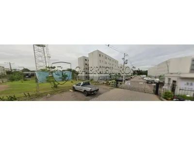 LOTE 001 - DIREITOS E AÇÕES do Apartamento nº 14, Bloco G, do Residencial Salgado Filho, localizado no andar térreo ou primeiro pavimento, com área real total de 56,702233 m², sendo 45,64 m² de área real privativa e 11,062233 m² de área real de uso comum, sendo 5,0985 m² de área coberta e 5,963733 m² de área descoberta. Constituído de sala de estar, cozinha/área de serviço, banheiro e 02 dormitórios. Situado na Rua Evaldo Luiz de Souza, nº 10, Bairro Canudos, Novo Hamburgo/RS. Registrado sob matrícula nº 128.678