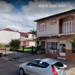 LOTE 007 - QUOTA PARTE DE TERRENO COM 320,00M2, COM UMA CASA DE MADEIRA COM ÁREA DE 79,20M2 E UM PRÉDIO COMERCIAL E UM ACRÉSCIMO RESIDENCIAL DE ALVENARIA COM A ÁREA DE 150,875M2, QUE TOMOU O Nº 440 DA AVENIDA JOÃO XXIII
