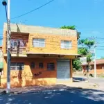 LOTE 007 - UM PRÉDIO DE ALVENARIA COM DOIS PISOS COM ÁREA TOTAL DE 314,00M2, LOCALIZADO NA RUA PORTÃO Nº 2676, BAIRRO BELA VISTA EM ESTÂNCIA VELHA/RS