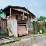 LOTE 003 - UM TERRENO, SITUADO NA ZONA ESPECIAL DE INTERESSE SOCIAL 2 (ZEIS 2), BAIRRO RINCÃO DOS ILHÉUS EM ESTÂNCIA VELHA - RS, COMPOSTO DO LOTE 05 DA QUADRA N DO LOTEAMENTO ALTO DA COLINA,  COM UMA RESIDENCIA DE ALVENARIA COM A ÁREA DE 24,30M2, NA RUA MARIA JULIA TREIN Nº 15.