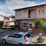 LOTE 007 - QUOTA PARTE DE TERRENO COM 320,00M2, COM UMA CASA DE MADEIRA COM ÁREA DE 79,20M2 E UM PRÉDIO COMERCIAL E UM ACRÉSCIMO RESIDENCIAL DE ALVENARIA COM A ÁREA DE 150,875M2, QUE TOMOU O Nº 440 DA AVENIDA JOÃO XXIII