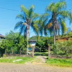 LOTE 012 - UM IMÓVEL COM A ÁREA SUPERFICIAL DE 751,27M2,  COM  UMA CASA RESIDENCIAL DE MADEIRA