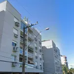 LOTE 001 - O apartamento residencial nº 501, Bloco B, localizado no quinto pavimento ou quarto andar, com área privativa de 124,99 m², e o Box nº 11 do Bloco B, com área privativa de 7,62 m², do Edifício Jardim Rivadávia Fernandes, situado na Rua Avaí, nº 338, Bairro Vila Rosa, Novo Hamburgo/RS. Registrados sob matrículas 32.945 e 32.961