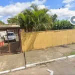 LOTE 003 - Casa com 02 domitórios, espaço de cozinha e sala integrados, 01 banheiro, 01 sala pequena, lavanderia e garagem coberta, e o respectivo terreno com área  superficial de 420 m², situada na Rua Curitiba, nº 2042, Bairro Mathias Velho, Canoas/RS. Registrado sob matrícula 41.867